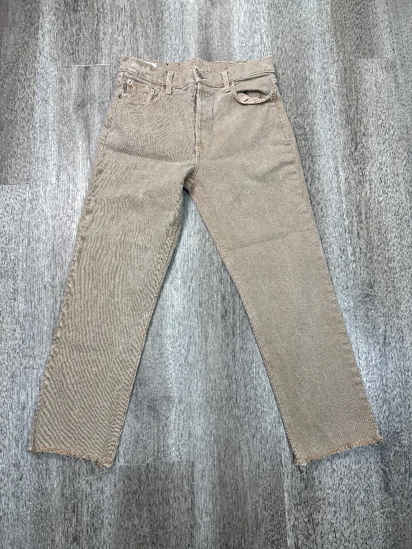 Light wash jeans with rips and tears for a casual vibeJeans Straight By Levis In Brown Denim, Size: 10