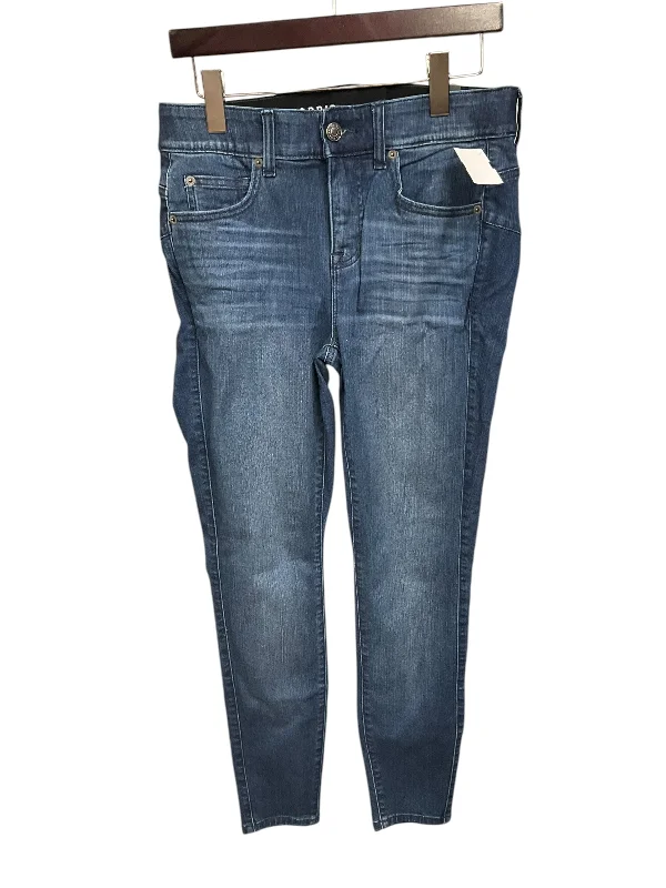 Jeans with distressing at the kneesJeans Skinny By Torrid In Blue Denim, Size: 10